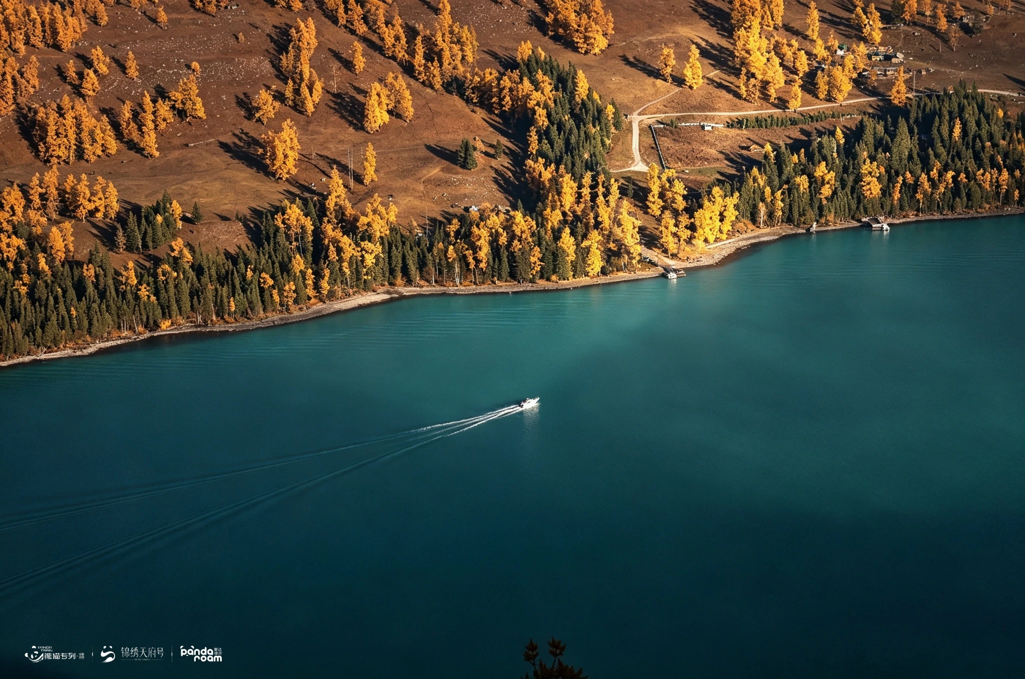 Small speedboat leaving a pale trail across blue-green water