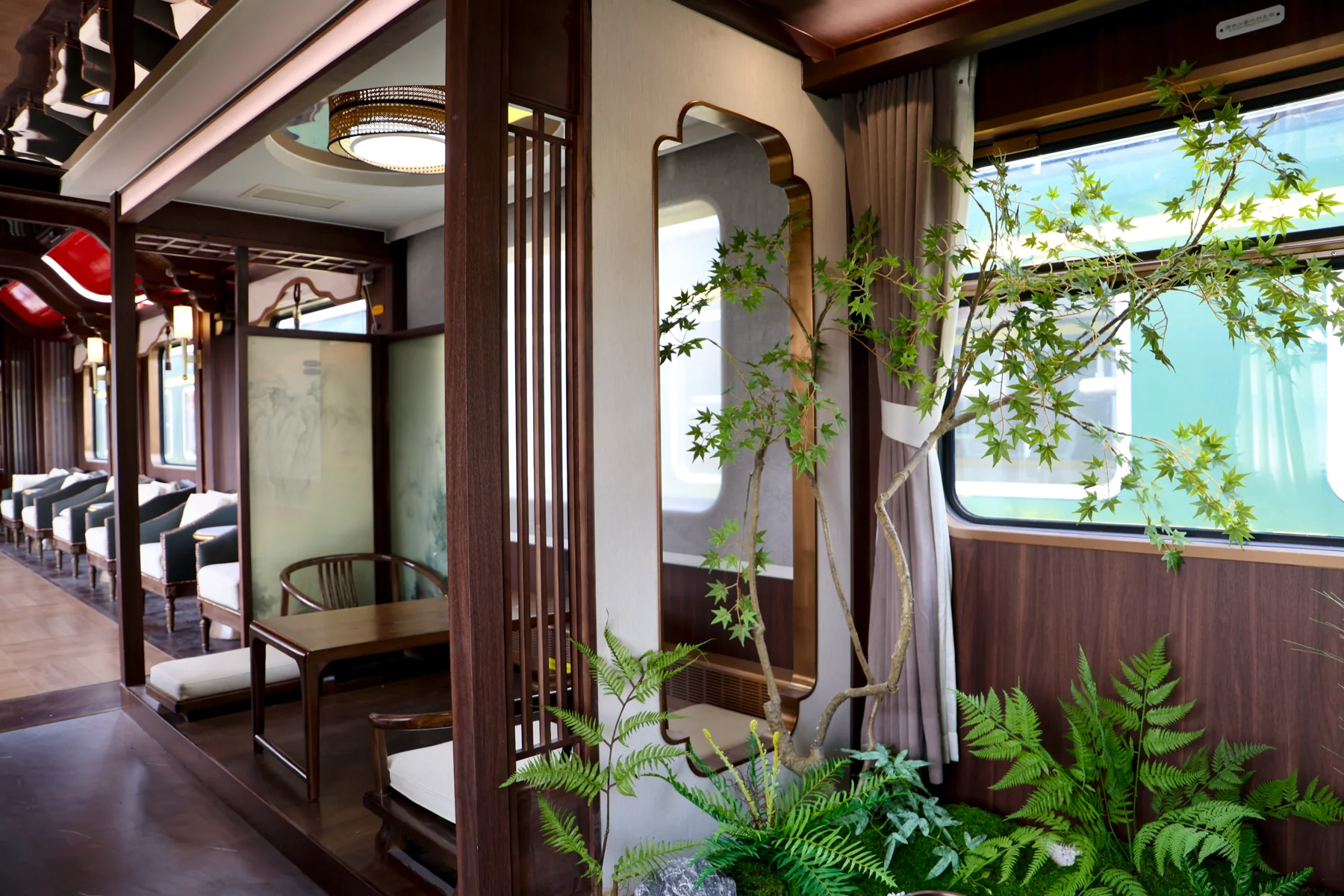 Seating and woodwork in the Jinya welcome car
